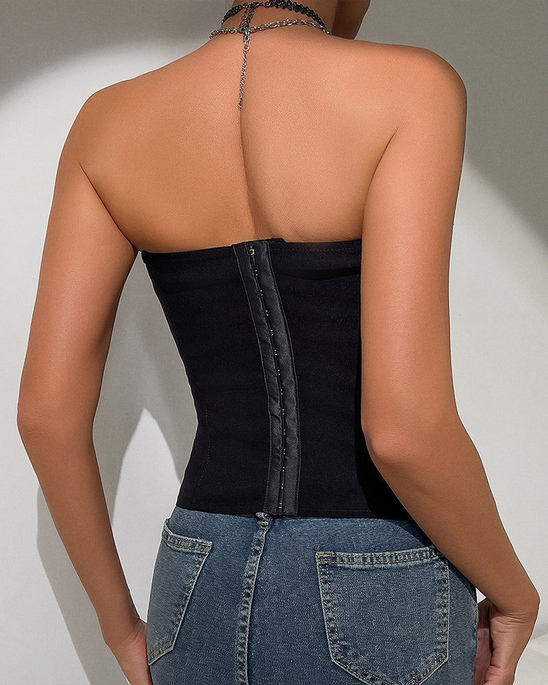 Black strapless corset top, back view with center vertical boning panel