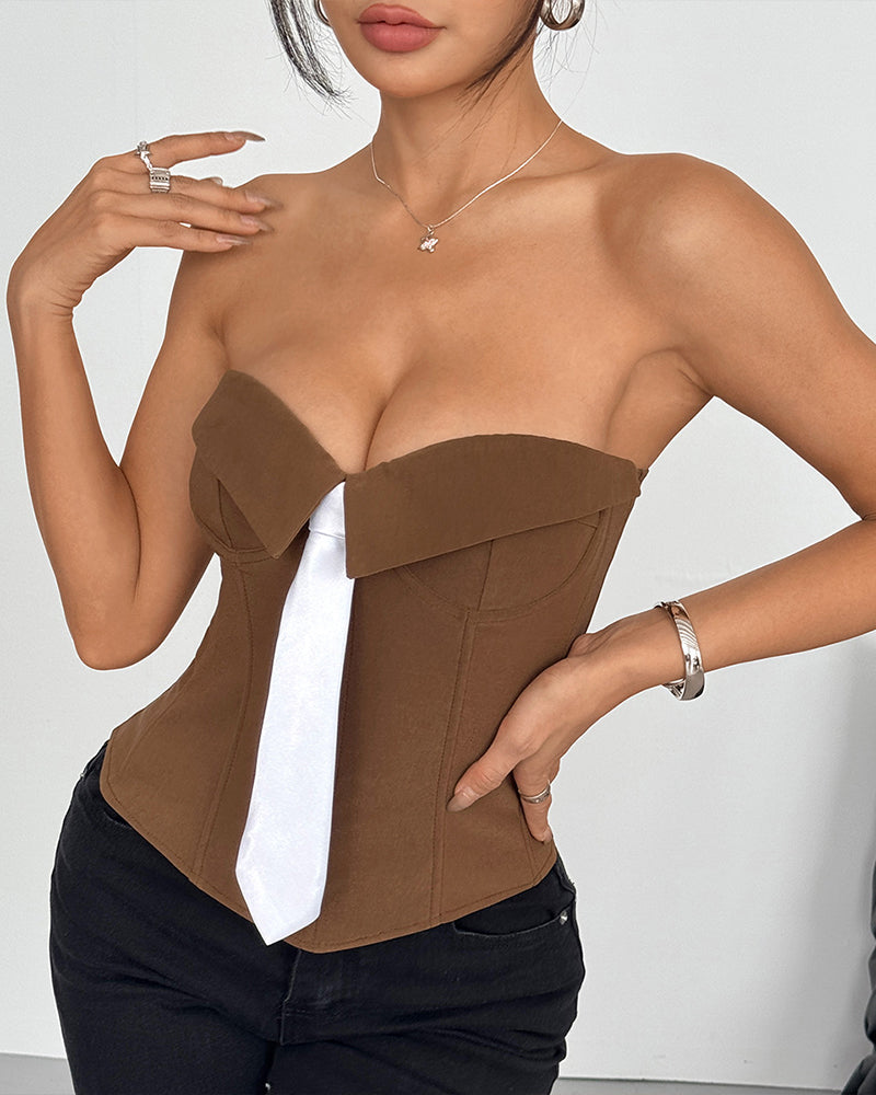 Brown strapless corset top with white satin necktie and sculpted boned fit