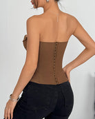 Brown strapless corset top back view with center buttoned boning panel
