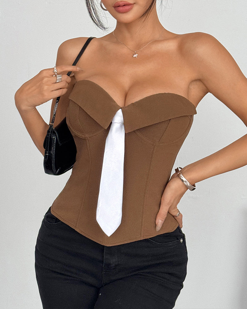 Brown strapless corset top with white satin necktie and fitted boned shape