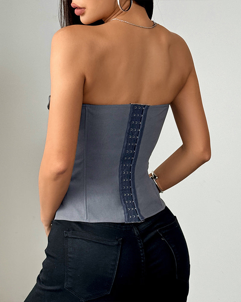 Dark blue strapless steel-boned corset top with front tie panel.