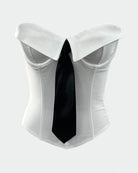 White strapless corset top with wide black tie panel and structured cups.