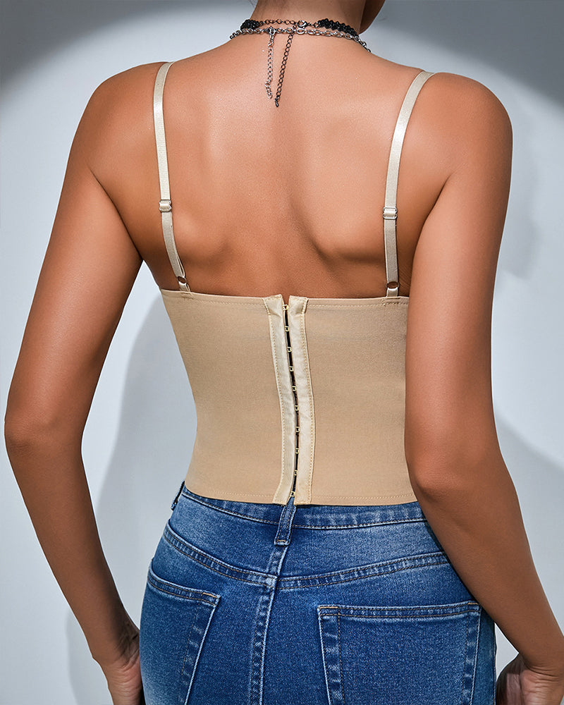 Beige corset top with open back and adjustable spaghetti straps