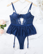 Navy lace hollow-out bodysuit with mini skirt and garter straps, underwire cups