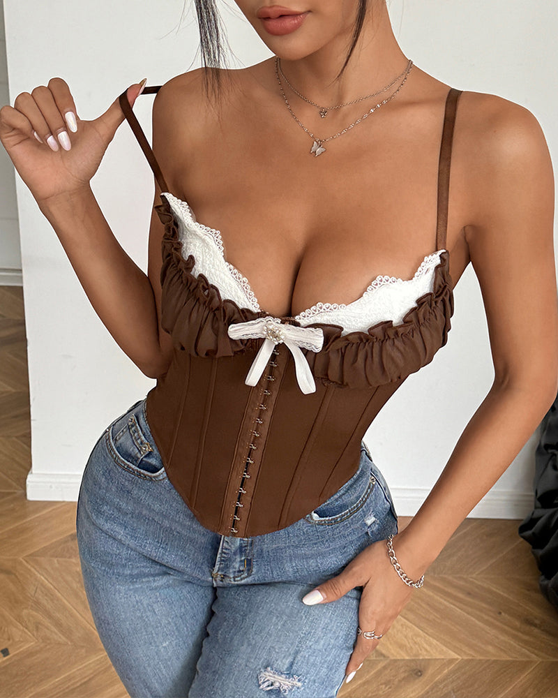 Brown corset bustier with ruffled white lace cups and lace-up front