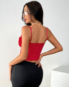 Red corset bustier back view with thin straps and vertical seam detailing