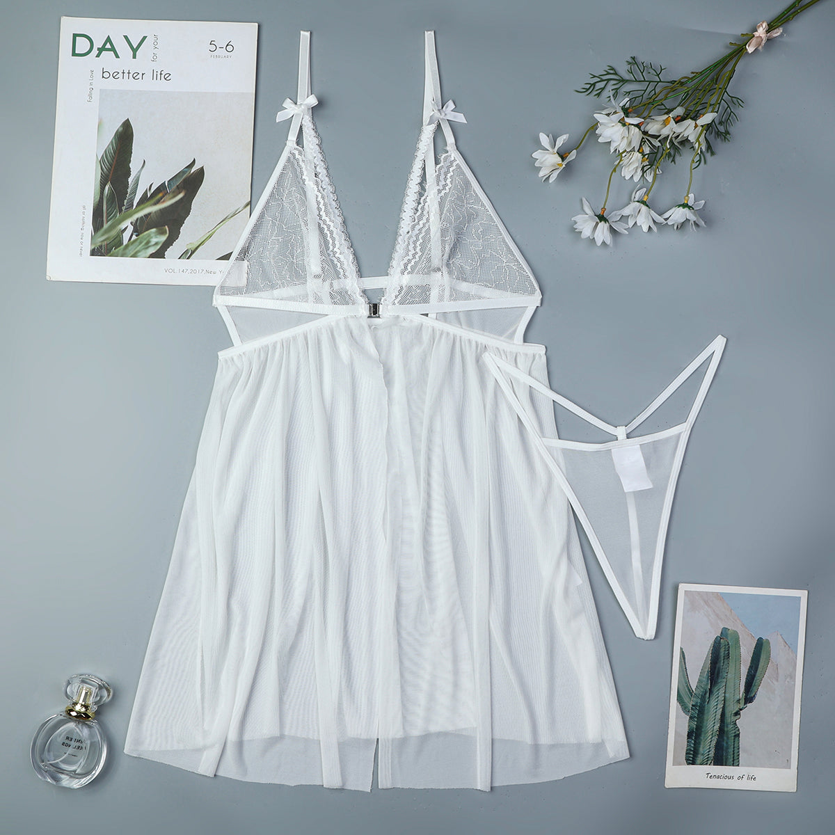 White lace nightdress with bowknot straps and flared babydoll skirt, sheer fabric