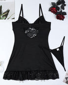 Black lace corset chemise set with bow cups and matching thong, flat lay