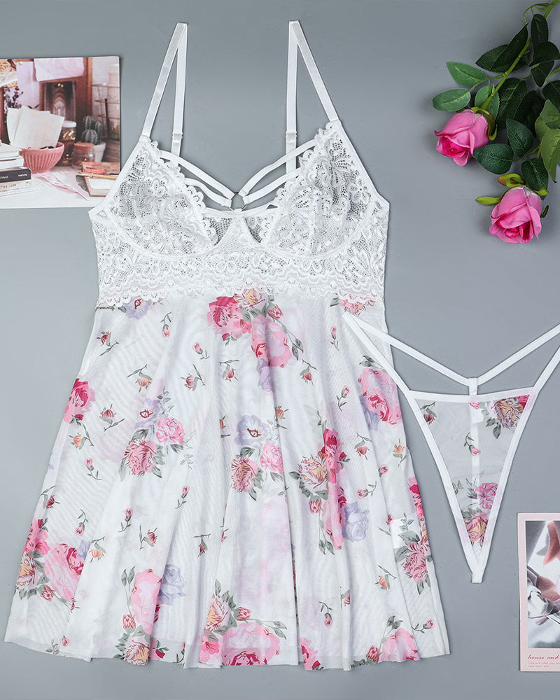 White floral babydoll lingerie set with lace cups and matching thong, laid flat