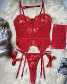Red lace corset lingerie set with garter straps, matching panties and thigh-high pieces