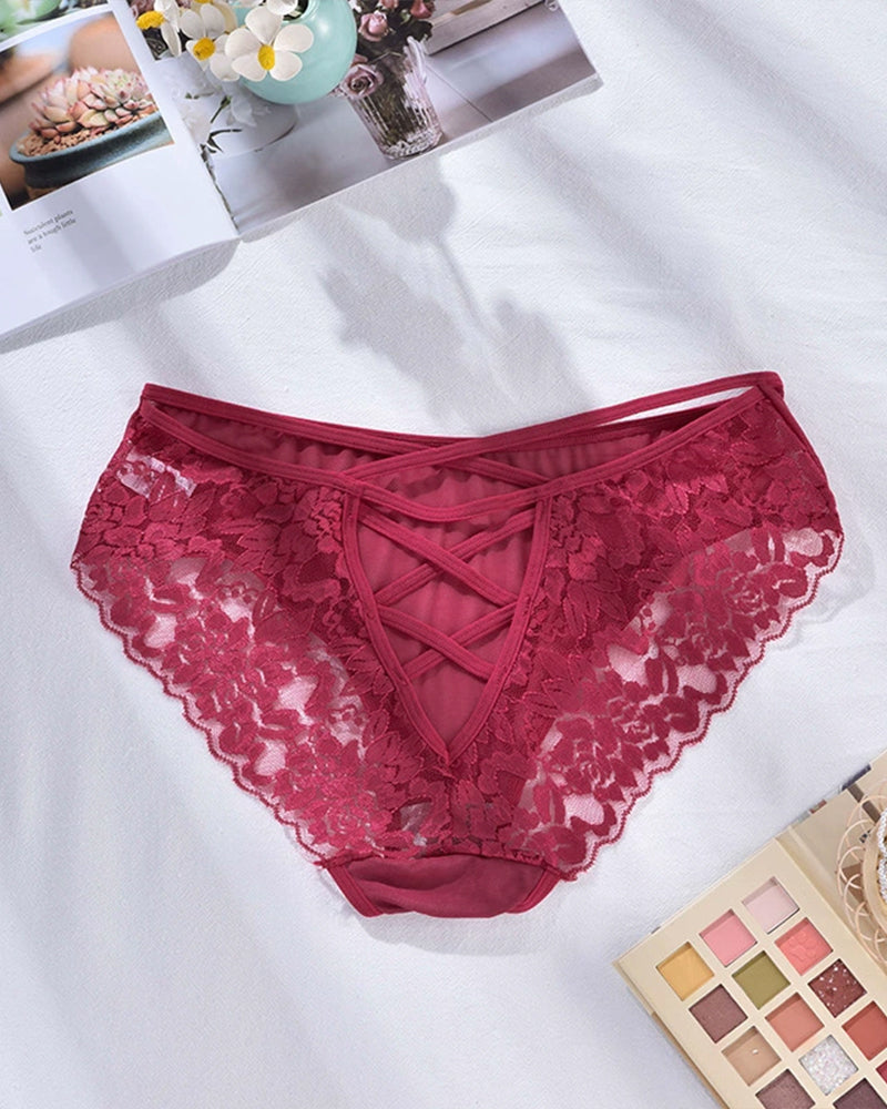 Red lace triangle panties with scalloped lace edges and crisscross front