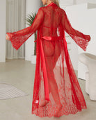 Red sheer lace robe dress with satin belt, open back, long flowing sleeves and train.