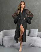 Black nightgown with belt, sheer heart sleeves with feather trim and front slit.