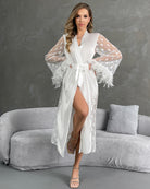 White nightgown with belt, sheer heart sleeves with feather trim and front slit.
