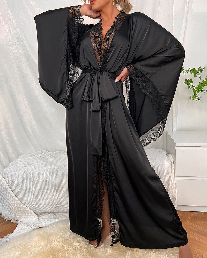 Black satin belted robe with contrast lace trim, long sleeves, and V-neck panel.