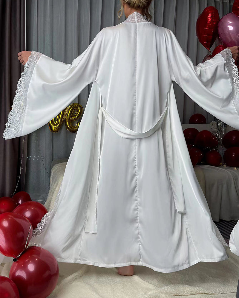 White satin belted robe with contrast lace trim, back view with tied waist and flared hem.