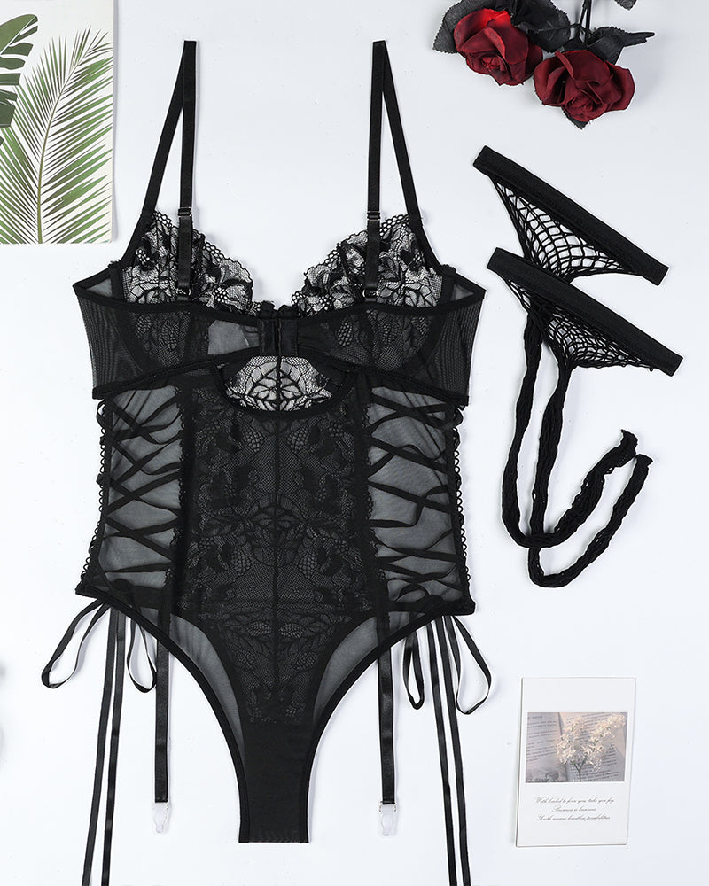 Black sheer floral lace bodysuit with lace-up side ties and ribbon-trim garter straps