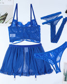 Blue lace lingerie set laid flat: bra top, ruffle mini skirt, garters, and fishnet stockings