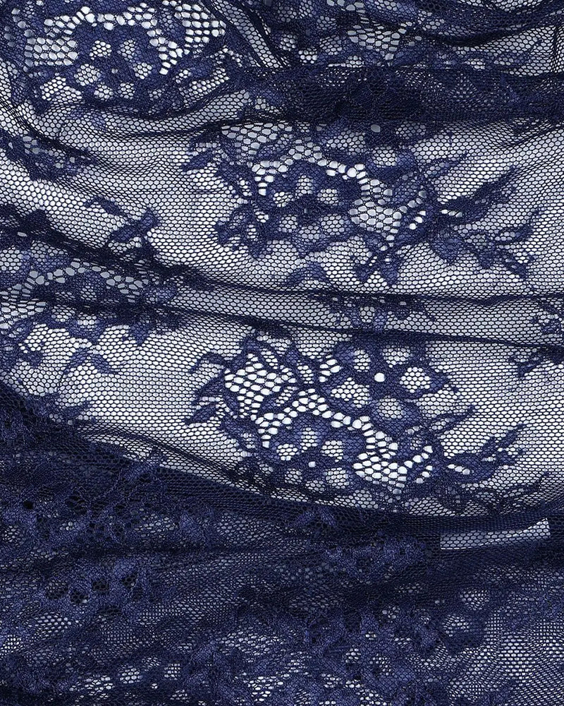 Navy lace fabric detail with floral pattern