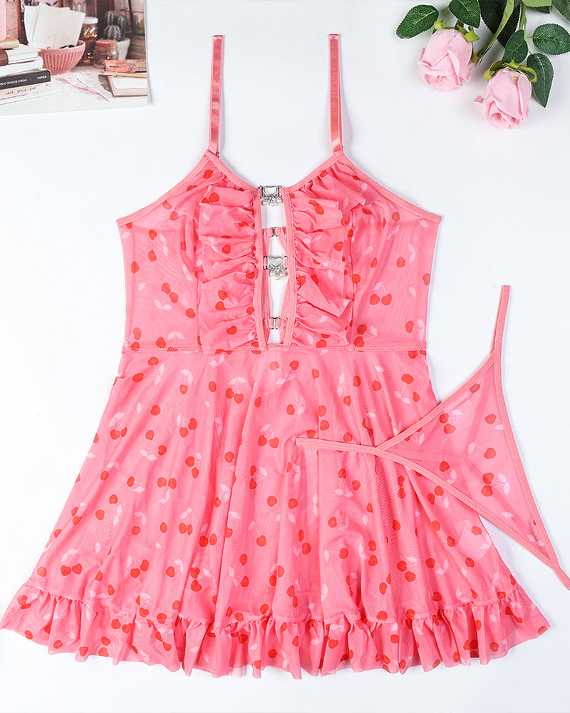 Pink heart-print babydoll dress with zipper front, bow straps, and ruffled hem
