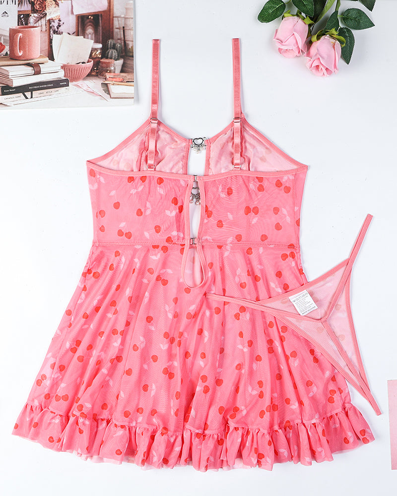 Pink heart-print babydoll dress with ruffled skirt and matching thong