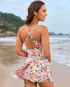 Floral print swim dress with crisscross back straps and knotted side drawstring
