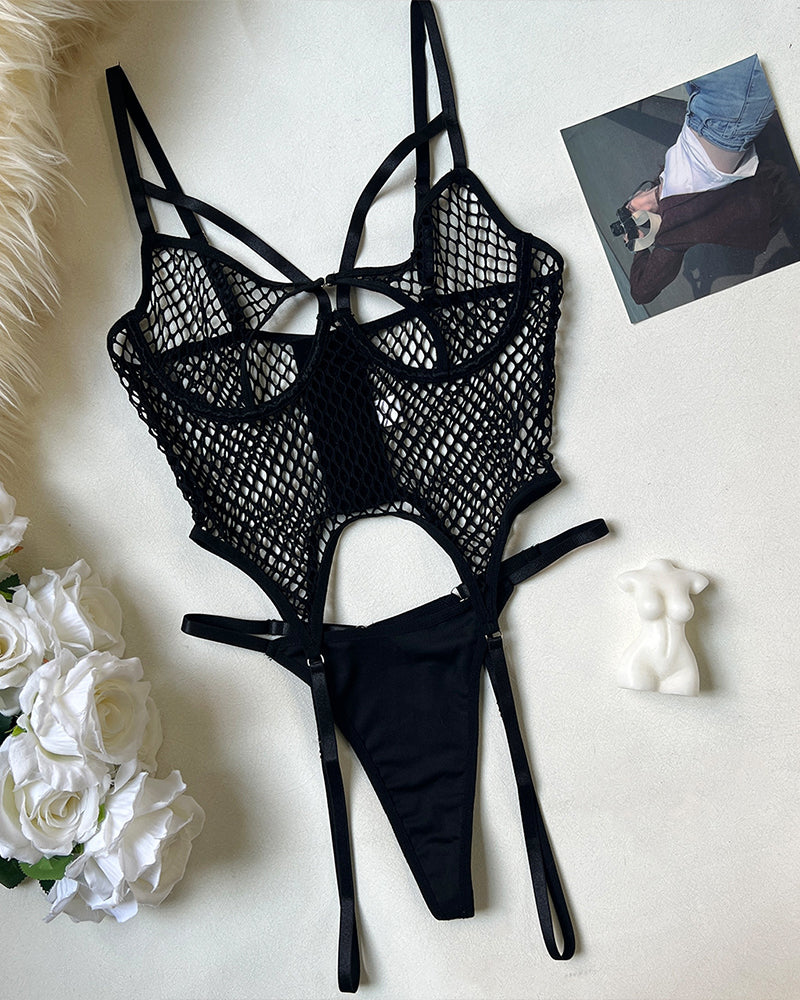 Black fishnet bodysuit with adjustable garter straps and thong bottom