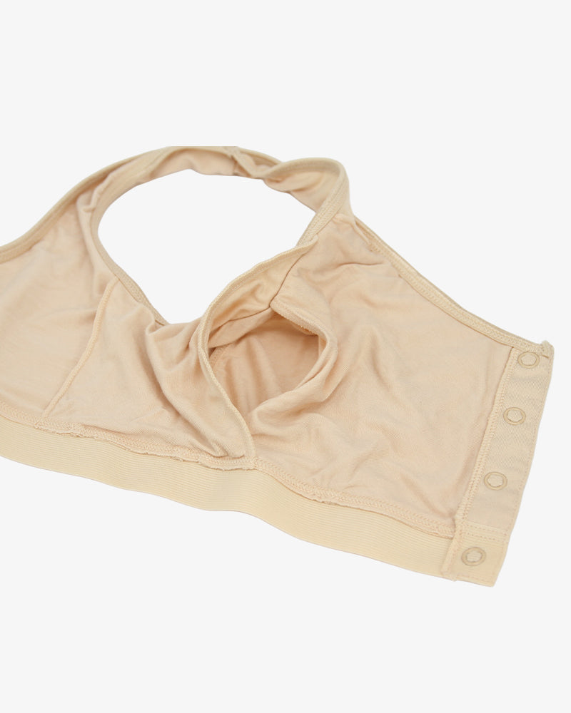 Beige non-wired bra top with scoop neckline, soft straps, and front button placket