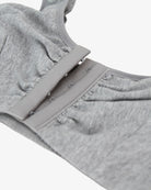 Grey bra close-up of front clasp placket and seam details