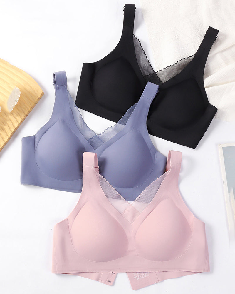 Three seamless push up bras: black, blue, and pink, with V-neck molded cups