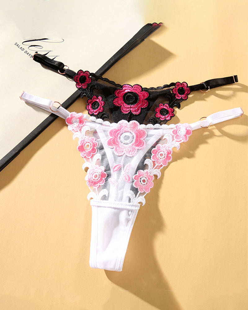 Low-waist triangle lace thong pair: black and white with pink floral embroidery