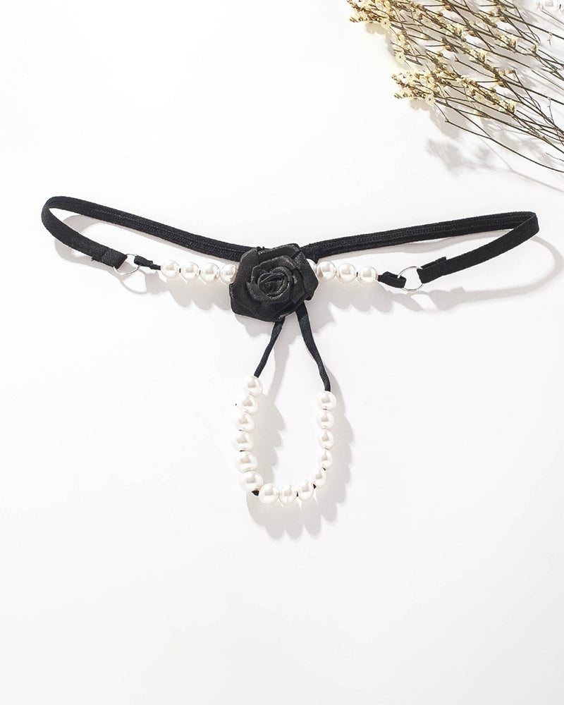 Black thong panties with rose rosette detail and pearl beaded straps