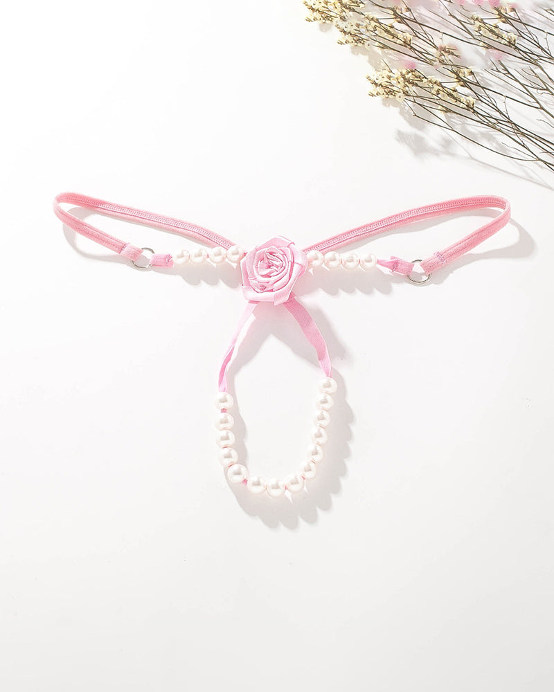 Pink thong panties with rose rosette detail and pearl beaded straps