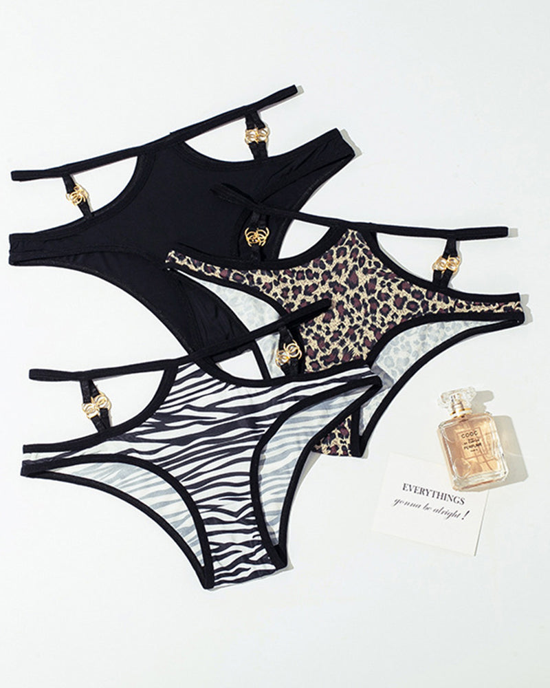 Assorted animal print and black panties with gold metal button accents, set of three