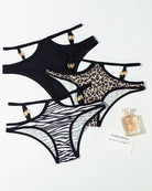 Assorted animal print and black panties with gold metal button accents, set of three