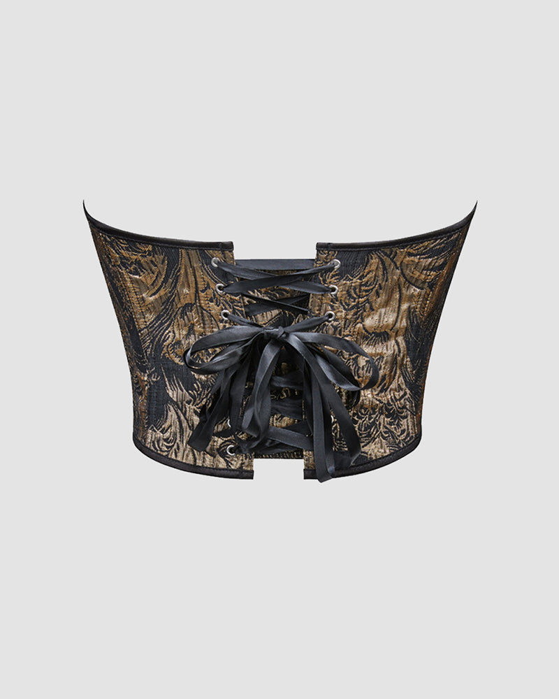 Black and gold waist training corset with lace-up back ties and brocade floral print
