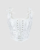 White corset with sweetheart neckline, floral jacquard, front lace-up, and ribbon bows