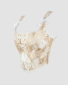 13-boned cotton corset, cream brocade with white ribbon lacing and tassel bow trim