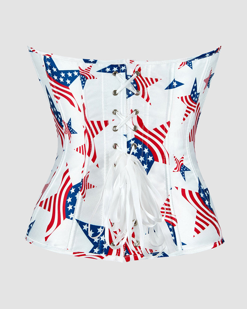 White cotton corset with star flag print, lace-up front and tassel waist detail