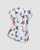White cotton corset with star flag print, structured seams and curved lower hem