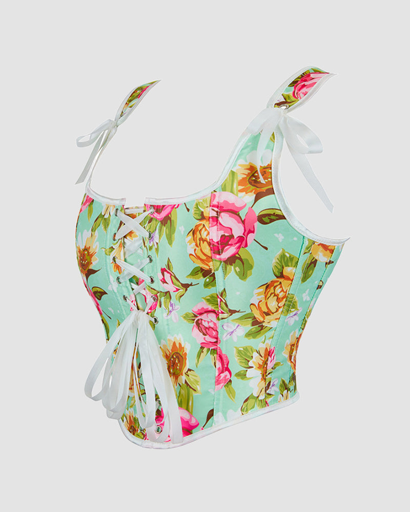 Floral cotton corset in mint green with ribbon tie straps and crisscross lacing