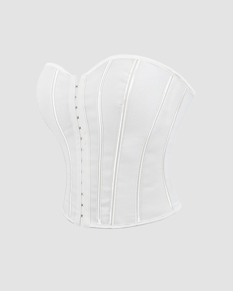 White cotton corset side view with vertical boning and center back closure