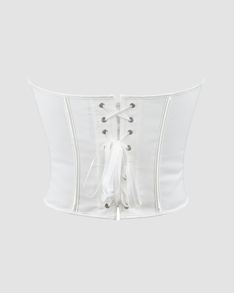 White cotton corset front with lace-up ties and eyelets, sweetheart neckline