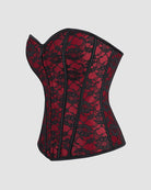 Dark red corset with black vertical boning seams and angled side profile