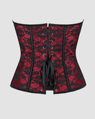 Dark red corset with black lacing eyelets and decorative tied cord at center