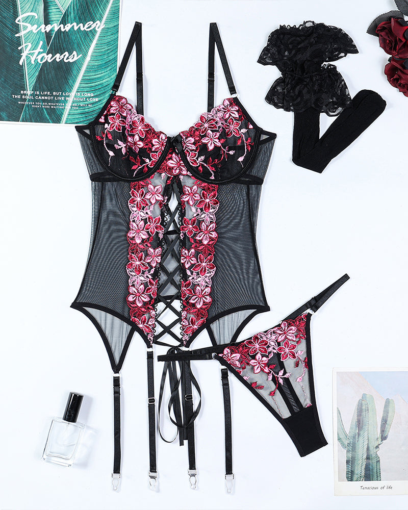 Floral embroidered corset bra set with matching garter belt and thong, black with pink flowers