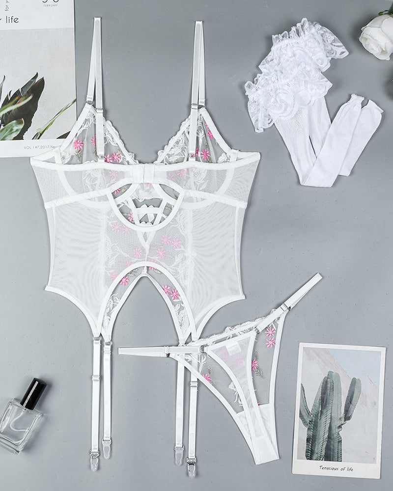 White floral embroidered lace lingerie set with garter straps and stockings, bow detail