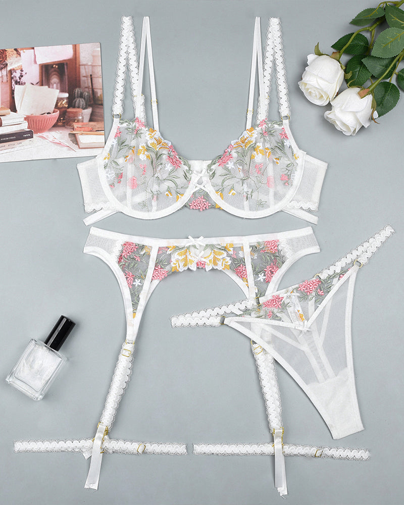 White floral embroidered bra set with garter belt and matching stockings, lace trim