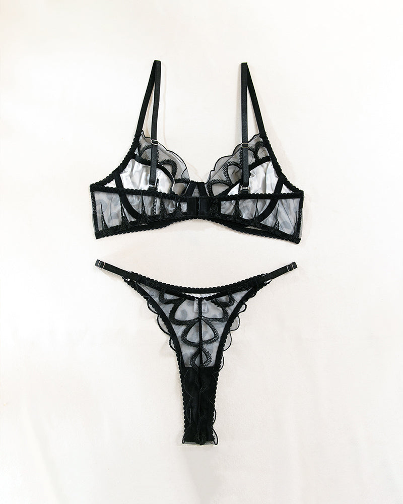 Black lace bra and thong set with sheer mesh panels and scalloped lace trim