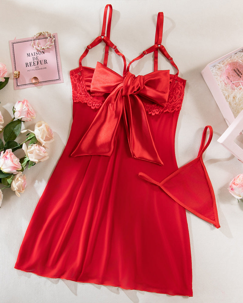Red lace nightdress with oversized bow at center front and spaghetti straps